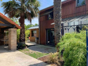 Maison de style cabane à 400m du bassin